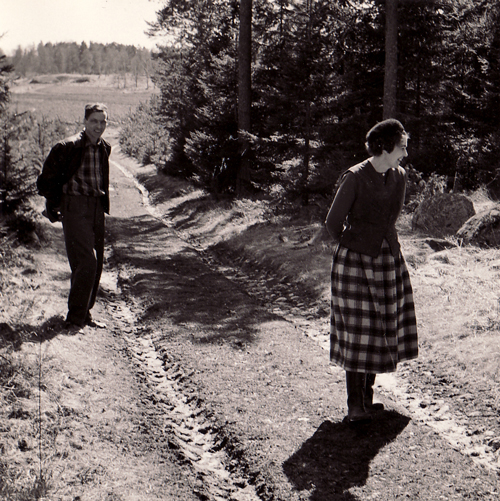 Mom and dad takes a walk in the countryside