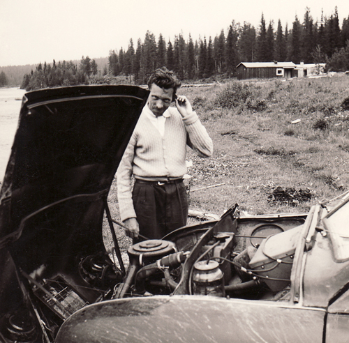 Dad tries to fix the car
