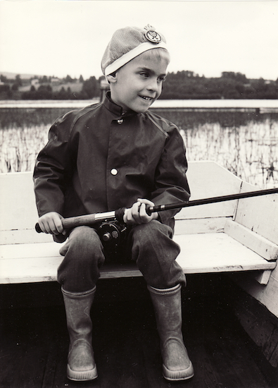 Torgny in Uncle Sven’s rowing boat in Lake Helgum