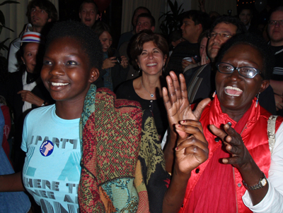 Supporters of the Democratic Party celebrate the first election results