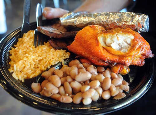 Chicken with rice beans and tortillas